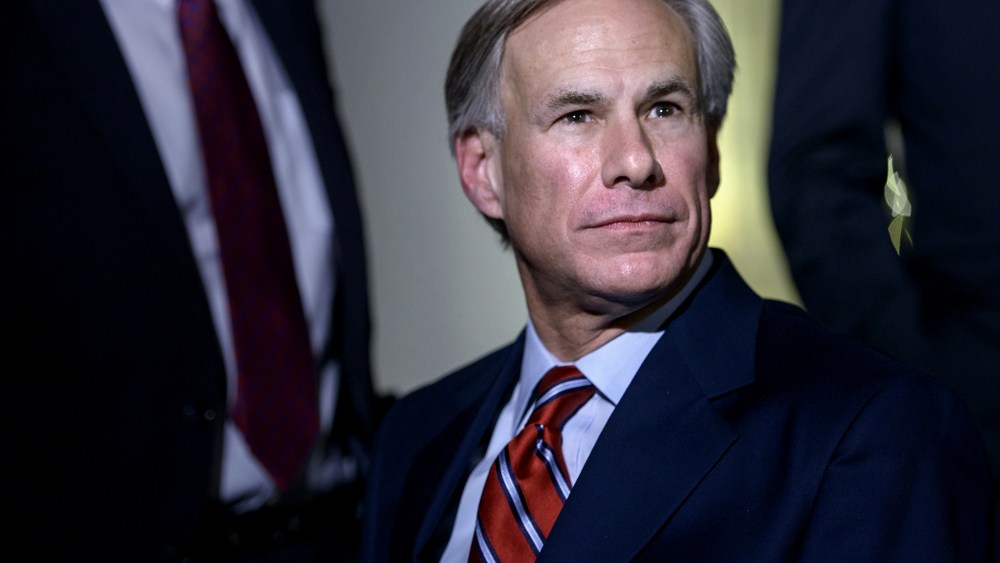 Texas Governor Greg Abbott (R-TX) listens to questions from the press after a meeting at the White House on Dec. 5, 2014 in Washington, DC.
