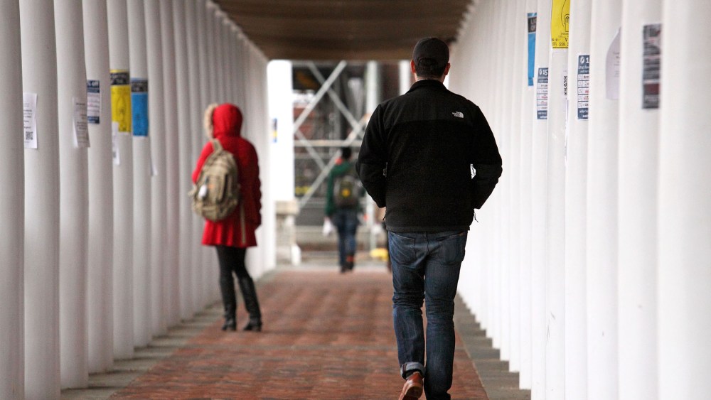 Students walk through an outdoor corridor on the on the University of Virginia campus on Dec. 6, 2014 in Charlottesville, Va. (Photo by Jay Paul/Getty)