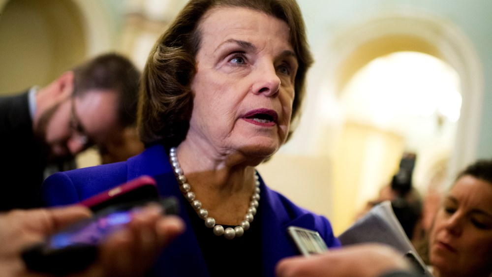 Sen. Dianne Feinstein, Chairwoman of the Senate Intelligence Committee, talks with reporters on Dec. 9, 2014. (Photo by Tom Williams/CQ Roll Call/Getty)