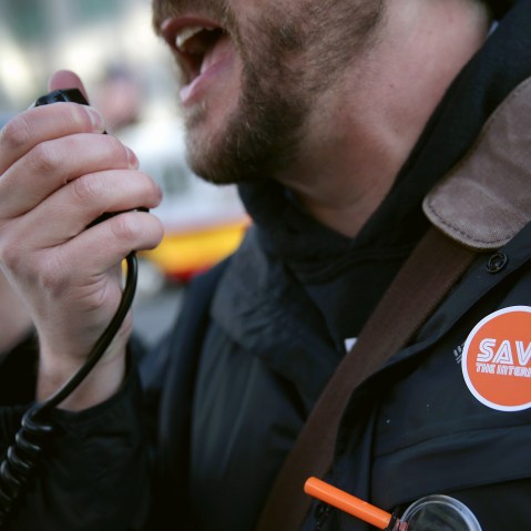 An activist speaks during a rally outside the headquarters of the Federal Communications Commission on Dec. 11, 2014 in Washington, DC. (Alex Wong/Getty)