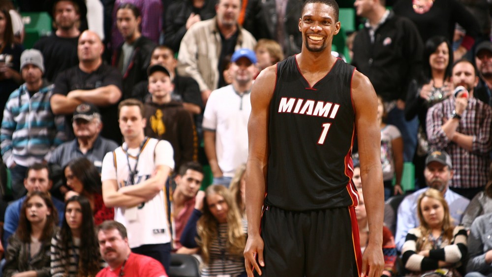 Chris Bosh #1 of the Miami Heat smiles after winning the game against the Utah Jazz at EnergySolutions Arena on Dec. 12, 2014 in Salt Lake City, Utah.