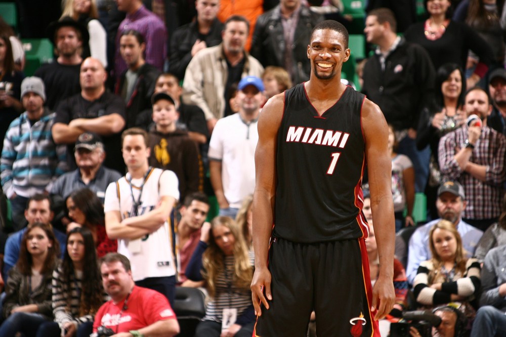 Chris Bosh #1 of the Miami Heat smiles after winning the game against the Utah Jazz at EnergySolutions Arena on Dec. 12, 2014 in Salt Lake City, Utah.
