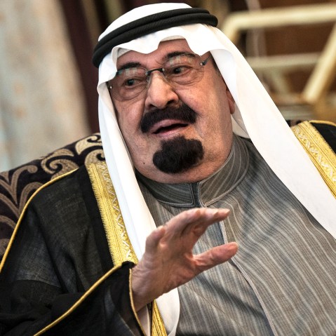 Saudi Arabia's King Abdullah bin Abdulaziz al-Saud speaks with the US Secretary of State during a meeting at the King's desert encampment on Jan. 5, 2014 in Rawdat al-Khuraim. (Photo by Brendan Smialowski/AFP/Getty)
