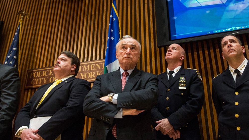 New York Police Department Commissioner Bill Bratton (C) attends a press conference on Dec. 22, 2014 in New York, NY. (Photo by Andrew Burton/Getty)