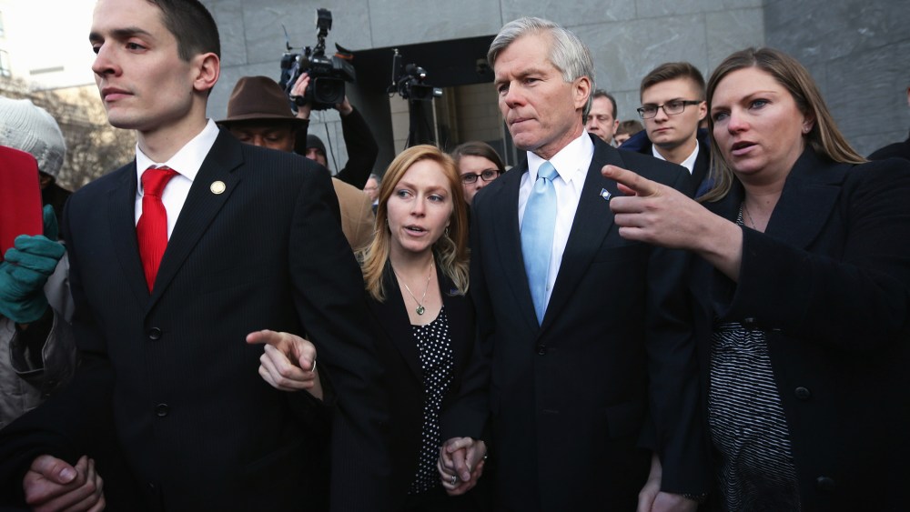 Former Virginia Governor Robert McDonnell (2nd R) comes out from U.S. District Court for the Eastern District of Virginia after his sentencing was announced by a federal judge on Jan. 6, 2015. (Photo by Alex Wong/Getty)