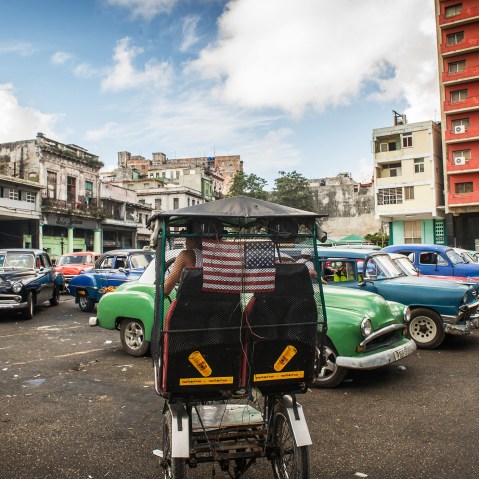 A pedicab with a national flag of the United States is seen in Havana, Cuba, on Jan. 7, 2015. (Photo by Yamil Lage/AFP/Getty)