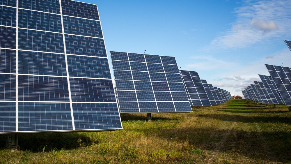 An array of 366 solar tracking devices stand in a field Oct. 31, 2014 in South Burlington, Vt. (Photo by Robert Nickelsberg/Getty)