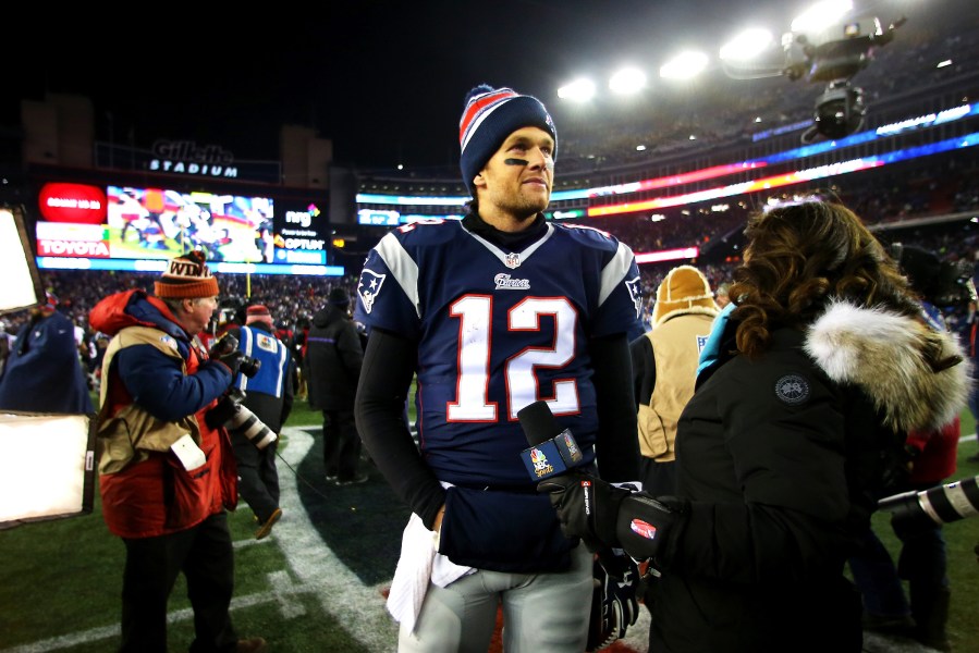 Tom Brady #12 of the New England Patriots speaks to media after defeating the Baltimore Ravens during the 2015 AFC Divisional Playoffs game at Gillette Stadium on Jan. 10, 2015 in Foxboro, Mass.
