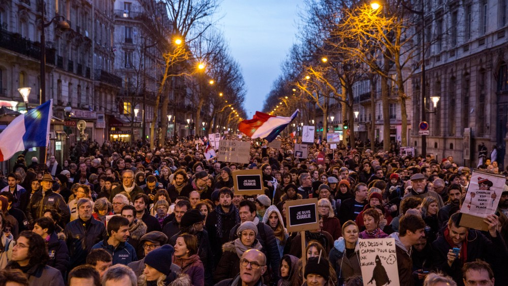 Demonstrators make their way along Place de la Republique during a mass unity rally following the recent terrorist attacks on Jan. 11, 2015 in Paris, France.