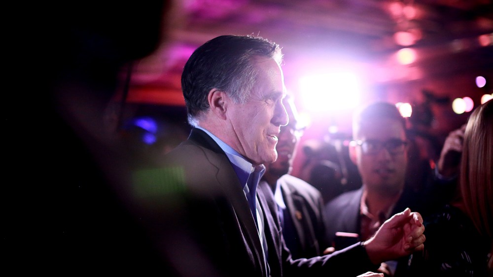 Mitt Romney is greeted by fellow Republicans at a dinner during the Republican National Committee's Annual Winter Meeting aboard the USS Midway on Jan. 16, 2015 in San Diego, Calif.