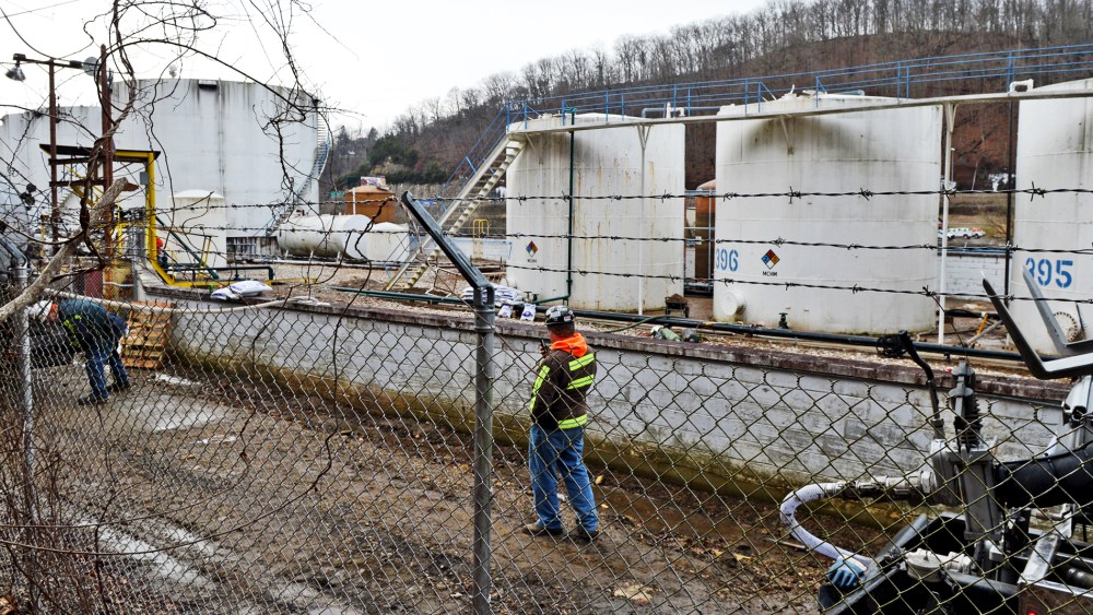 Leaking MCHN tanks at Freedom Industries are being off loaded into tanker trucks in Charleston, West Virginia, Jan. 10, 2014.