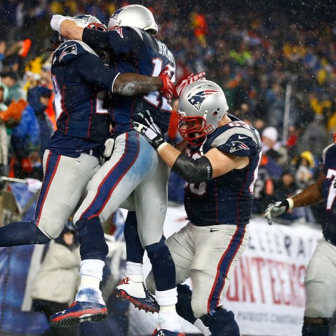 Members of the New England Patriots celebrate a touchdown against the Indianapolis Colts of the 2015 AFC Championship Game at Gillette Stadium on Jan. 18, 2015 in Foxboro, Mass.