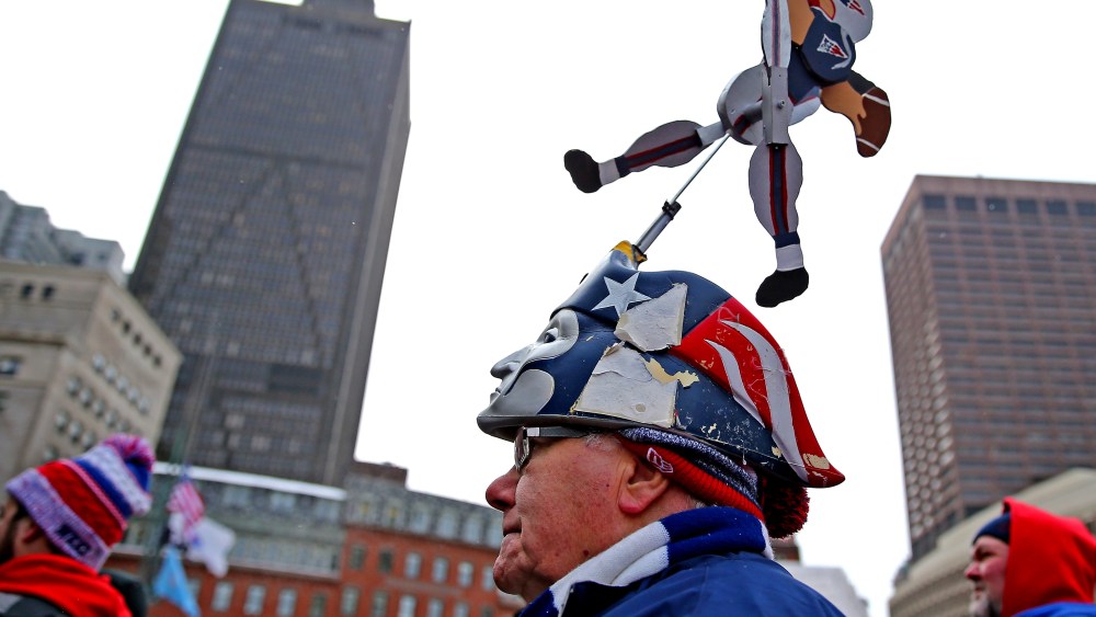 Fans attend the New England Patriots Send-Off Rally at City Hall Plaza on Jan. 26, 2015 in Boston, Massachusetts. The Patriots will face the Seattle Seahawks in Superbowl XLIX on Sunday. (Photo by Maddie Meyer/Getty)