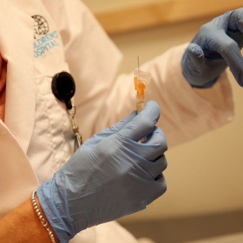 Miami Children's Hospital pediatrician Dr. Amanda Porro, M.D prepares to administer a measles vaccination to a child at the Miami Children's Hospital on Jan. 28, 2015 in Miami, Fla. (Photo by Joe Raedle/Getty)