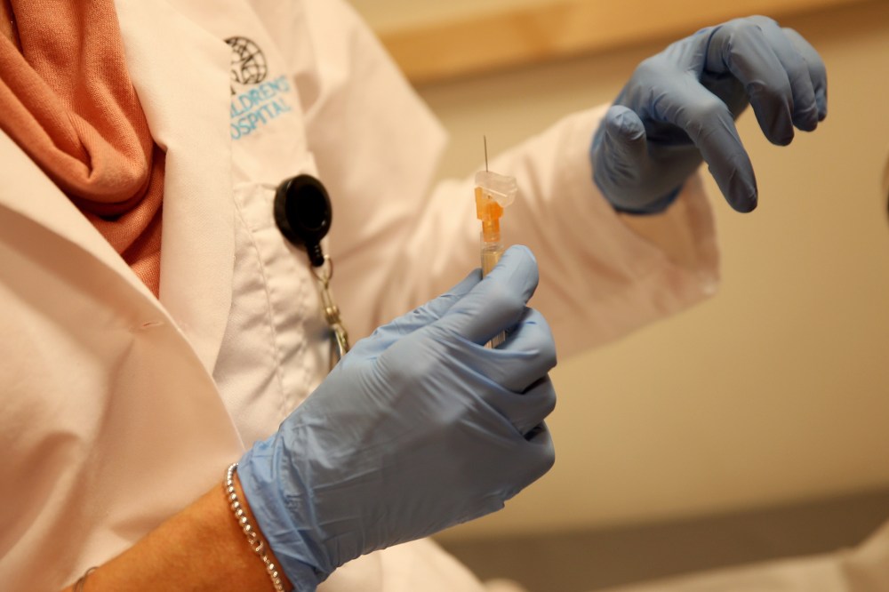 Miami Children's Hospital pediatrician Dr. Amanda Porro, M.D prepares to administer a measles vaccination to a child at the Miami Children's Hospital on Jan. 28, 2015 in Miami, Fla. (Photo by Joe Raedle/Getty)