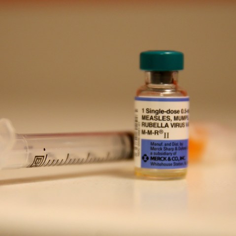 In this photo illustration, a bottle containing a measles vaccine is seen at the Miami Children's Hospital on Jan. 28, 2015 in Miami, Fla. (Photo by Joe Raedle/Getty)