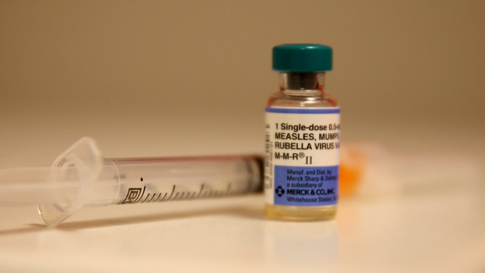 In this photo illustration, a bottle containing a measles vaccine is seen at the Miami Children's Hospital on Jan. 28, 2015 in Miami, Fla. (Photo by Joe Raedle/Getty)