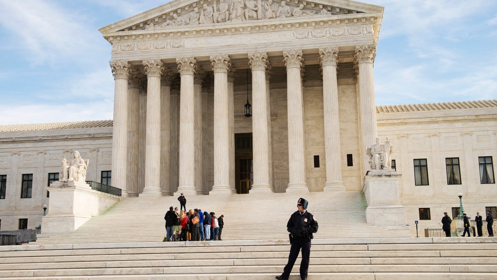 Visitors line up in front of the Supreme Court.