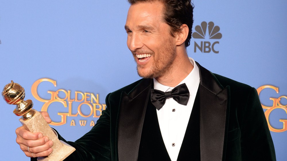 Actor Matthew McConaughey celebrates winning Best Actor in a Motion Picture - Drama for "Dallas Buyers Club" in the press room during the 71st Annual Golden Globe Awards in Beverly Hills, Calif., January 12, 2014.