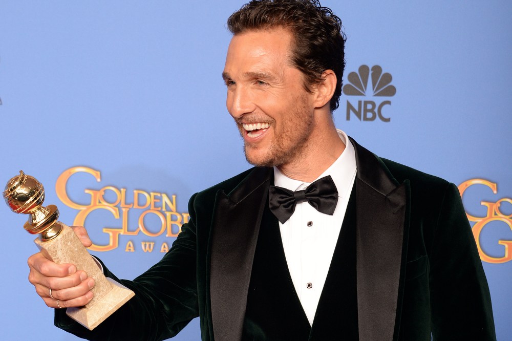 Actor Matthew McConaughey celebrates winning Best Actor in a Motion Picture - Drama for "Dallas Buyers Club" in the press room during the 71st Annual Golden Globe Awards in Beverly Hills, Calif., January 12, 2014.