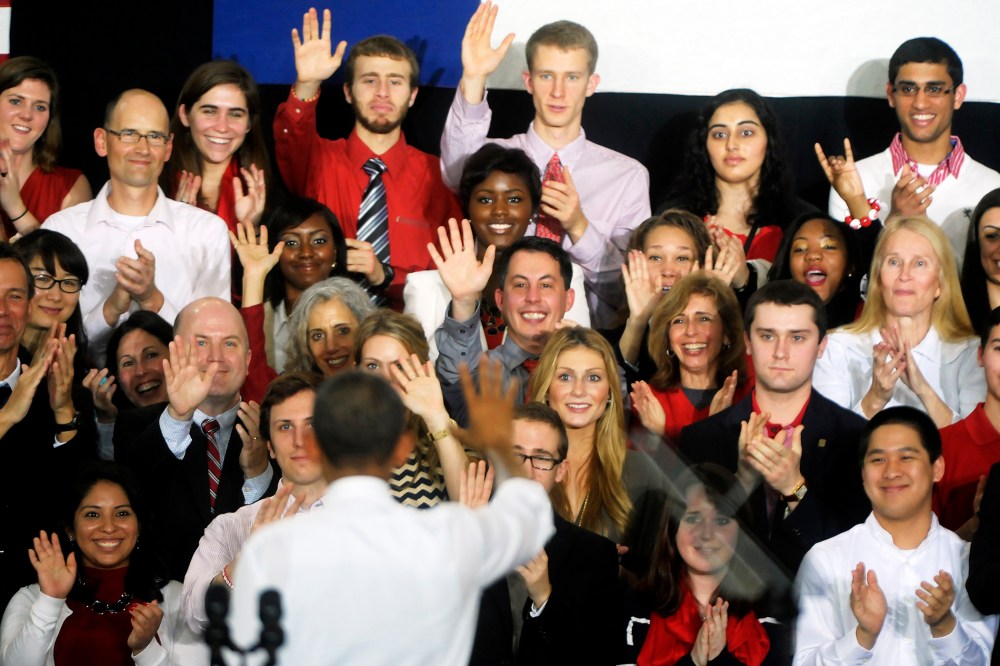 U.S. President Barack Obama waves farewell to a crowd at the JW Isenhour Tennis Center on the campus of North Carolina State University on January 15, 2014 in Raleigh, North Carolina.
