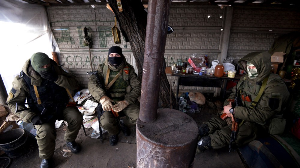 Pro-Russian separatist fighters man a checkpoint near the airport of Donetsk on Feb. 7, 2015. (Photo by Dominique Faget/AFP/Getty)