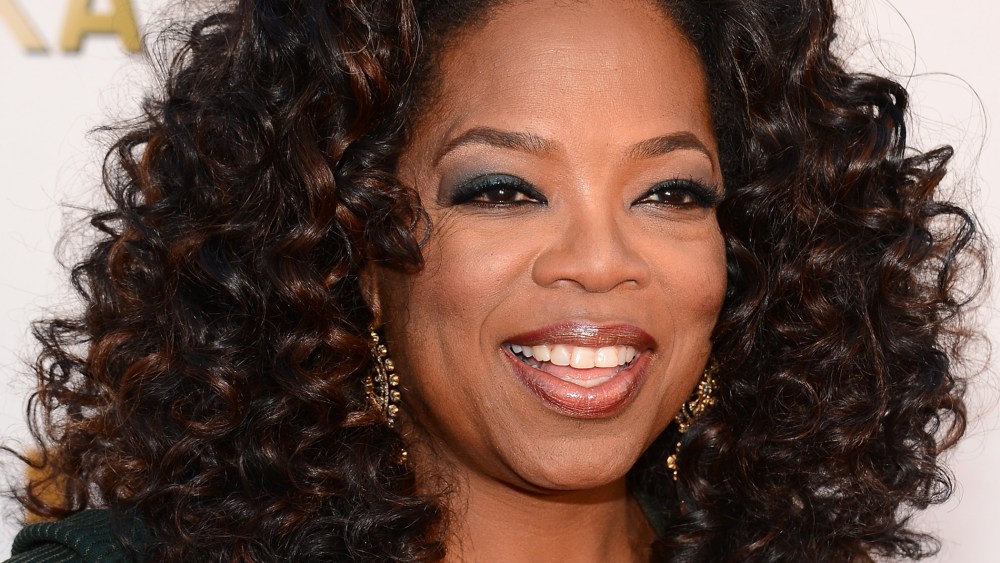 Oprah Winfrey attends the 19th Annual Critics' Choice Movie Awards at Barker Hangar on January 16, 2014 in Santa Monica, California.
