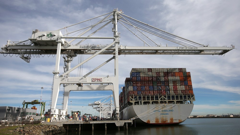 A container ship sits docked in a berth at the Port of Oakland on Feb. 11, 2015 in Oakland, Calif. (Photo by Justin Sullivan/Getty)
