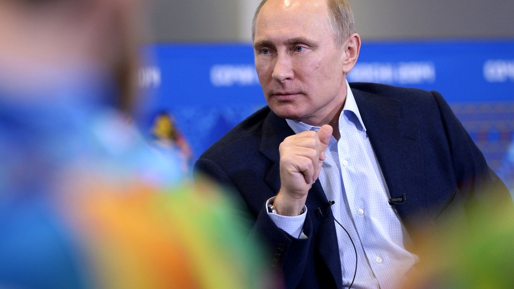 Russian President Vladimir Putin meets upcoming Olympic games' volunteers, Jan. 17, 2014 in Sochi, Russia.