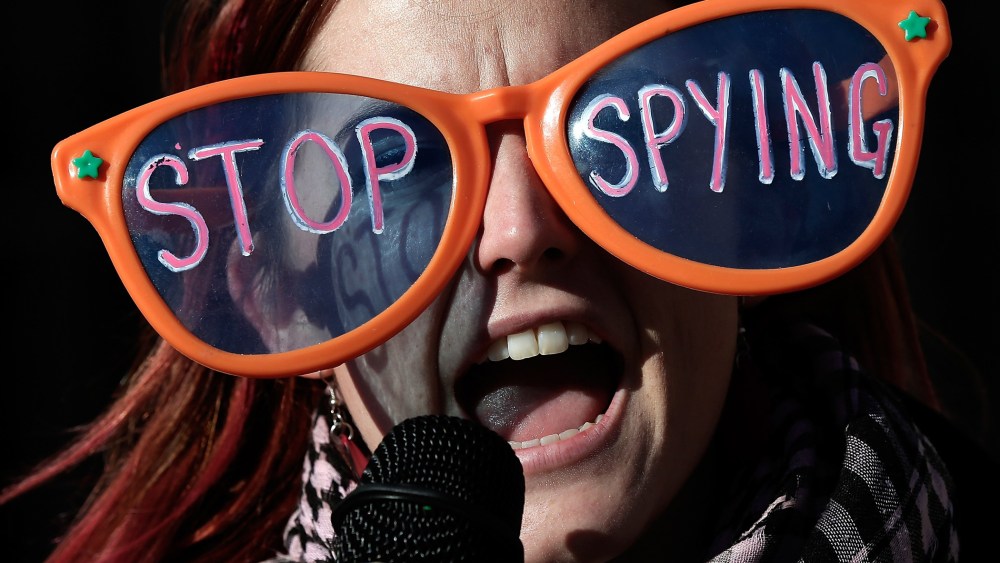 Alli McCracken joins activists protesting the surveillance of U.S. citizens by the NSA outside the Justice Department, January 17, 2014 in Washington, D.C.