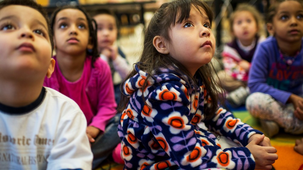 Students quietly listen in art class at Campbell Elementary School, in Arlington, VA, Jan. 14, 2014.