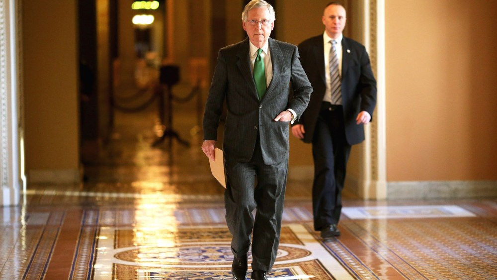 Senate Majority Leader Mitch McConnell (R-KY) walks from his office in the U.S. Capitol to the Senate chamber on Feb. 23, 2015 in Washington, D.C. (Photo by Chip Somodevilla/Getty)