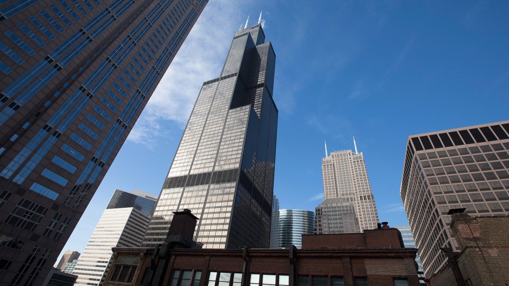 The Willis Tower (C), formerly known as the Sears Tower, dominates the southern end of the downtown skyline in Chicago, Illinois. (Photo by Scott Olson/Getty)