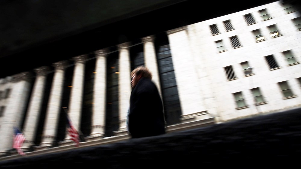 A person walks by the New York Stock Exchange on Jan. 27, 2014 in New York City.
