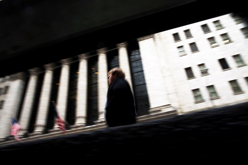 A person walks by the New York Stock Exchange on Jan. 27, 2014 in New York City.
