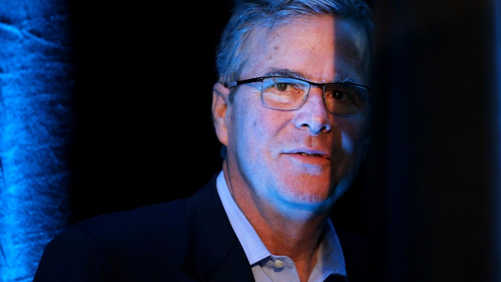 Former Florida Governor Jeb Bush waits to be introduced at the Iowa Ag Summit on March 7, 2015 in Des Moines, Iowa. (Photo by Scott Olson/Getty)