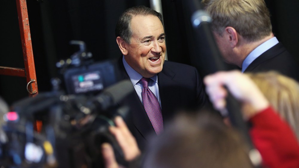 Former Governor Mike Huckabee of Arkansas fields questions from reporters at the Iowa Ag Summit on March 7, 2015 in Des Moines, Iowa. (Photo by Scott Olson/Getty)