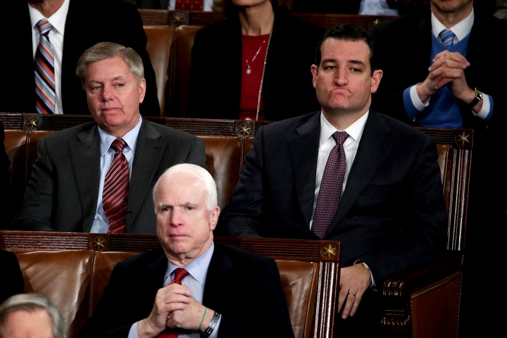 Sen. Lindsey Graham, Sen. John McCain, and Sen. Ted Cruz listen to the State of the Union address, Jan. 28, 2014.