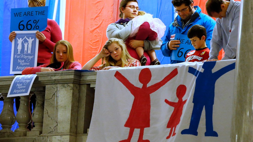 Demonstrators hold an anti-gay marriage rally inside the Utah State Capitol on Jan. 28, 2014.