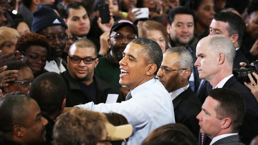 Barack Obama greets supporters, local politicians and store employees after delivering remarks in Lanham, Maryland, Jan. 29, 2014.