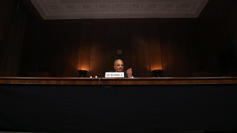 Attorney General Eric Holder testifies during a Senate Judiciary Committee hearing on Capitol Hill, on Jan. 29, 2014 in Washington, D.C. (Photo by Mark Wilson/Getty)