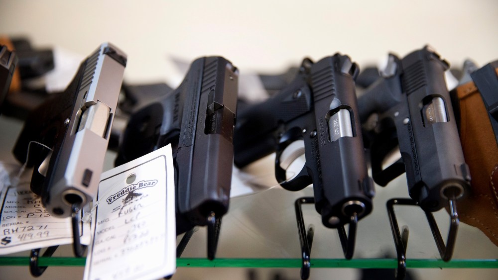 Handguns are offered for sale at Freddie Bear Sports on March 11, 2015 in Tinley Park, Ill. (Photo by Scott Olson/Getty)