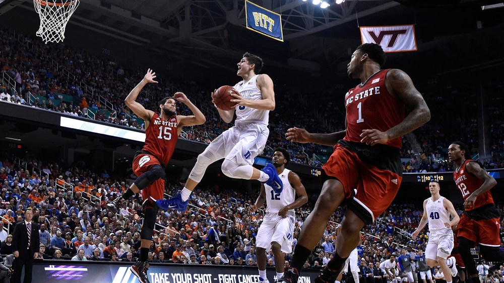 Grayson Allen #3 of the Duke Blue Devils drives to the basket against Cody Martin #15 of the North Carolina State Wolfpack during the quarterfinals of the ACC Basketball Tournament at Greensboro Coliseum on March 12, 2015 in Greensboro, N.C.