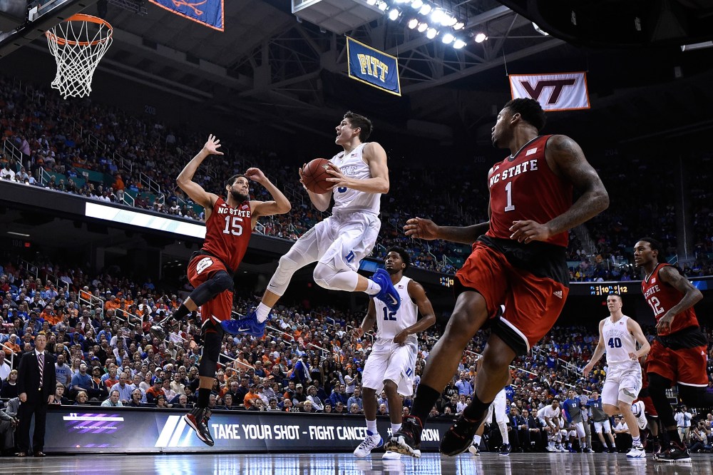 Grayson Allen #3 of the Duke Blue Devils drives to the basket against Cody Martin #15 of the North Carolina State Wolfpack during the quarterfinals of the ACC Basketball Tournament at Greensboro Coliseum on March 12, 2015 in Greensboro, N.C.