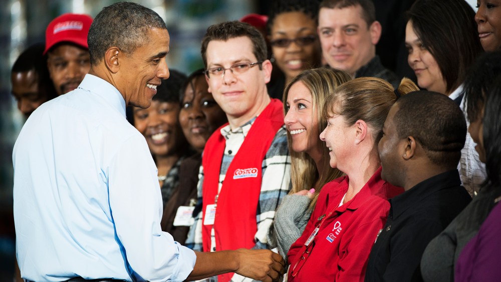 President Barack Obama greets Costco employees after his speech on the economy at a Costco Store Lanham, MD on Jan. 29, 2014.
