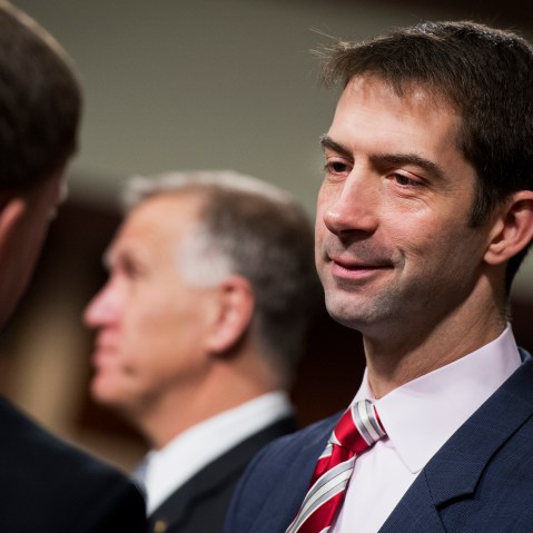 Sen. Tom Cotton, R-Ark., right, talks with colleagues before a hearing in Dirksen Building on March 19, 2015, in Washington, D.C. (Photo by Tom Williams/CQ Roll Call/Getty)