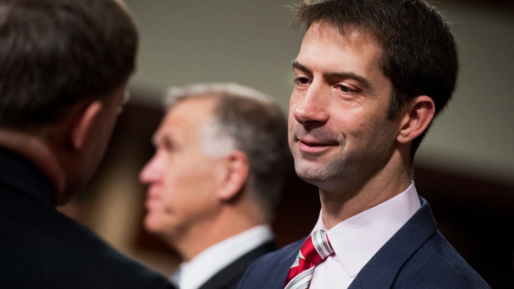 Sen. Tom Cotton, R-Ark., right, talks with colleagues before a hearing in Dirksen Building on March 19, 2015, in Washington, D.C. (Photo by Tom Williams/CQ Roll Call/Getty)