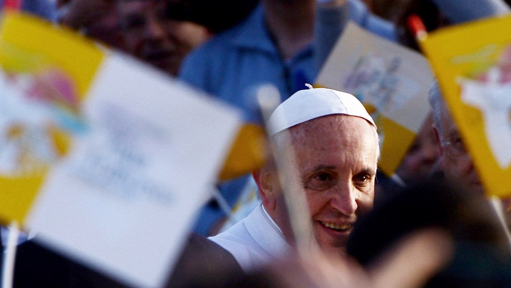 Pope Francis arrives for a meeting with youth and families as part of a pastoral visit on March 21, 2015 in Naples, Italy. (Photo by Filippo Monteforte/AFP/Getty)