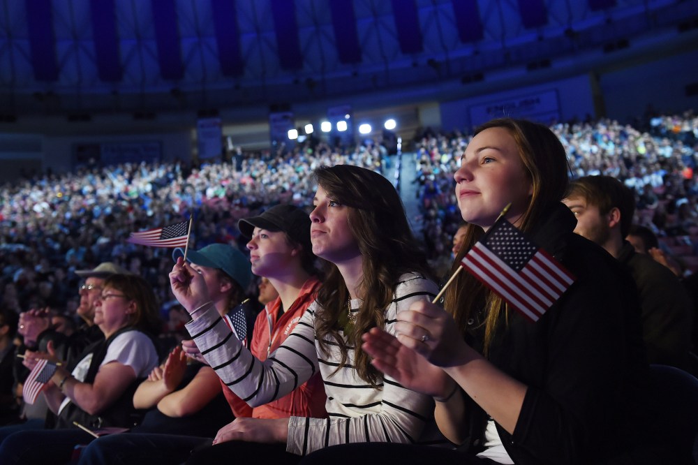 Liberty University student, Carley Bouwer, right, listens to Senator Ted Cruz (R-Texas) as he makes a speech to announce his candidacy for a presidential bid at Liberty University on March 23, 2015 in Lynchburg, Va.