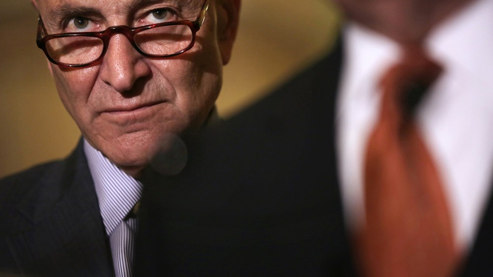 Sen. Charles Schumer (D-NY) listens during a news briefing after the weekly Democratic Policy Luncheon March 24, 2015 at the U.S. Capitol in Washington, D.C. (Photo by Alex Wong/Getty)